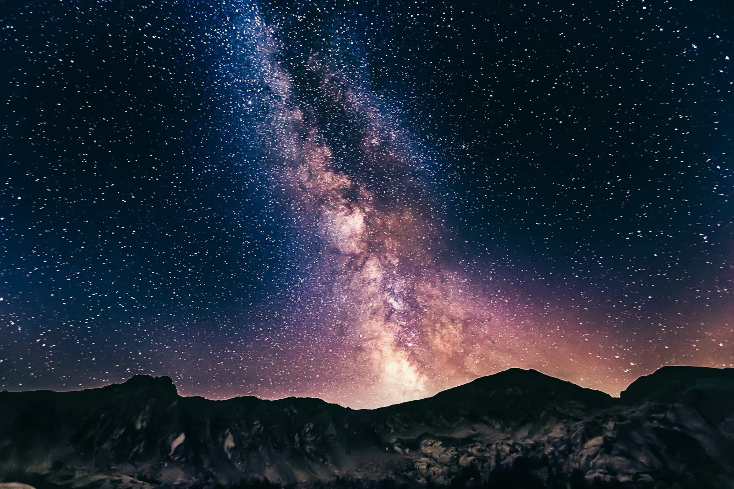 The Milky Way over a backcountry camp
