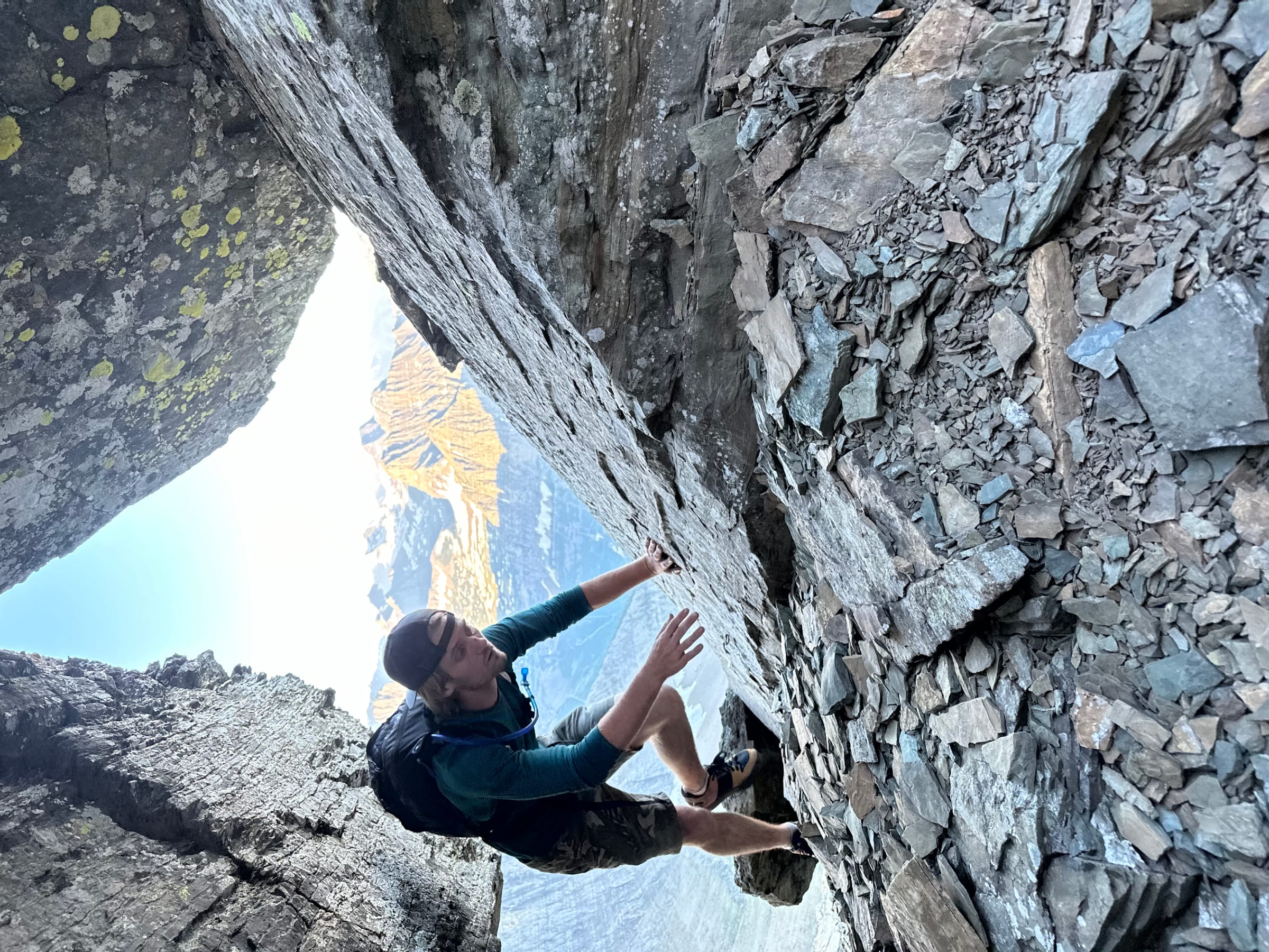 A climber on a rock face in Glacier National Park