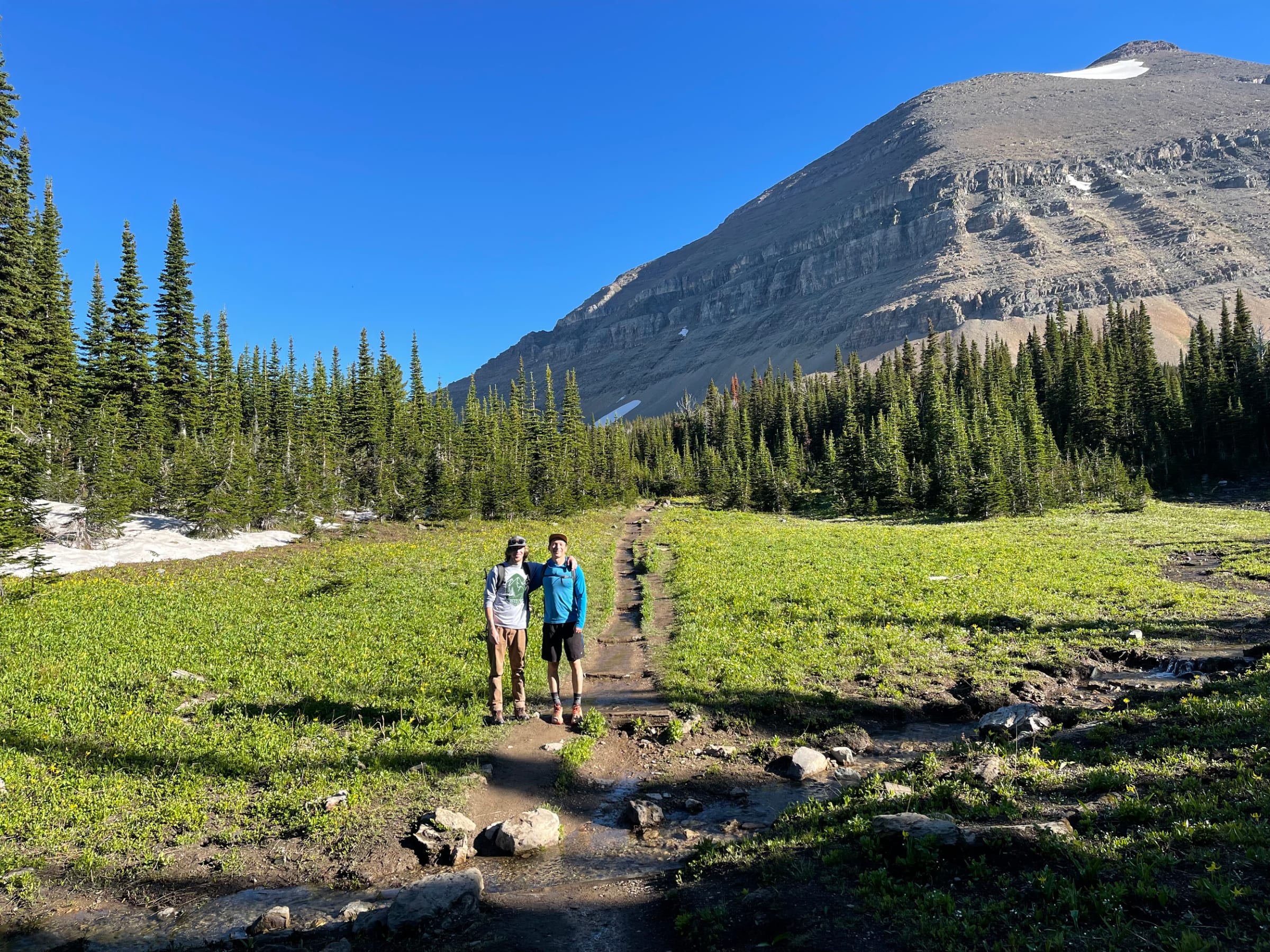 Hikers on the trail to Siyeh Pass